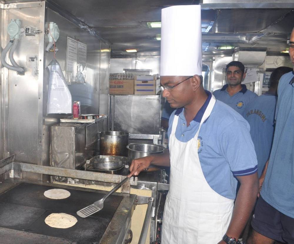 Officer Incharge, 'Foremast' making Roti for Inter-mast Cooking Competition